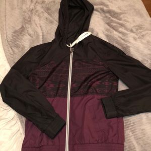 Black and purple tribal print windbreaker